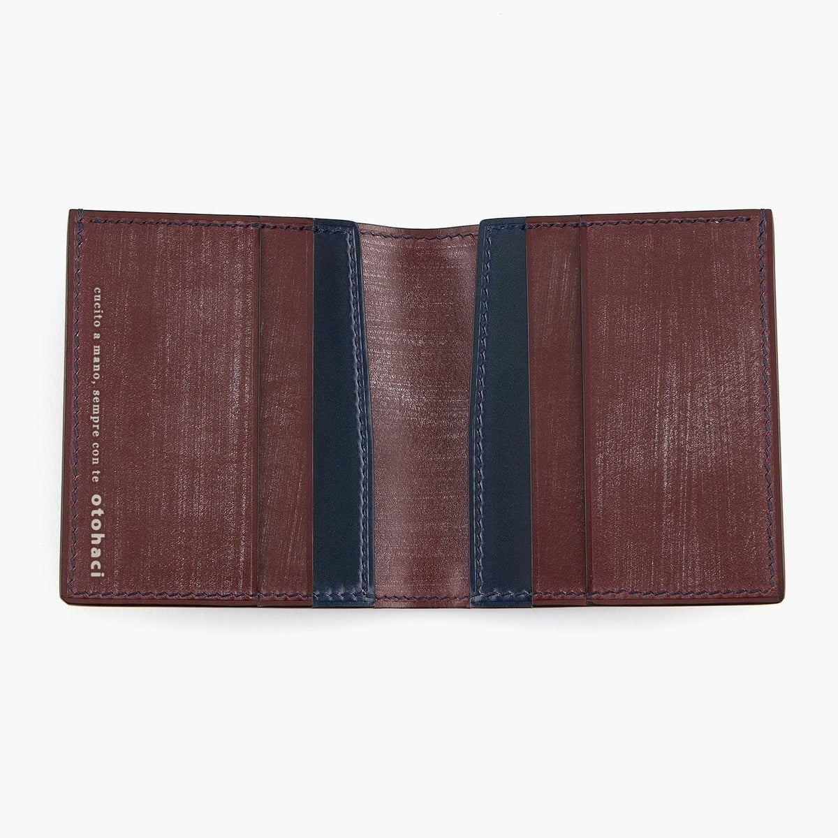 外装（コードバン）：Navy、内装（ブライドル）：Wine、糸色：外装と同系色、ファスナーテープ：外装と同系色、ファスナー：Silver